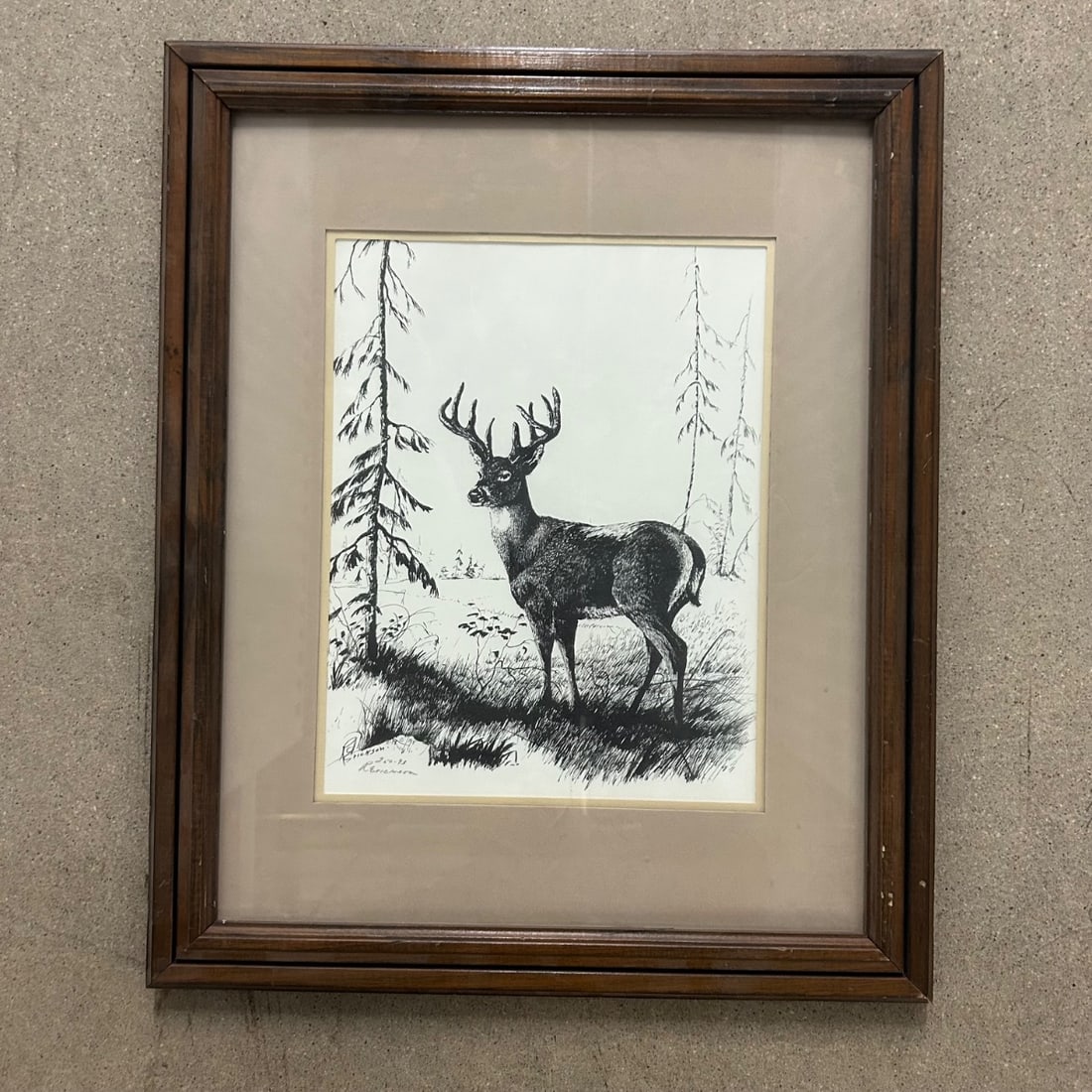 R Erickson Signed Whitetail Deer Landscape Ink Drawing Framed 1978 Art: This is a captivating ink drawing of a whitetail deer in a woodland setting, expertly rendered by artist R. Erickson. The piece is signed by the artist and dated '1978' in the lower left corner. The d