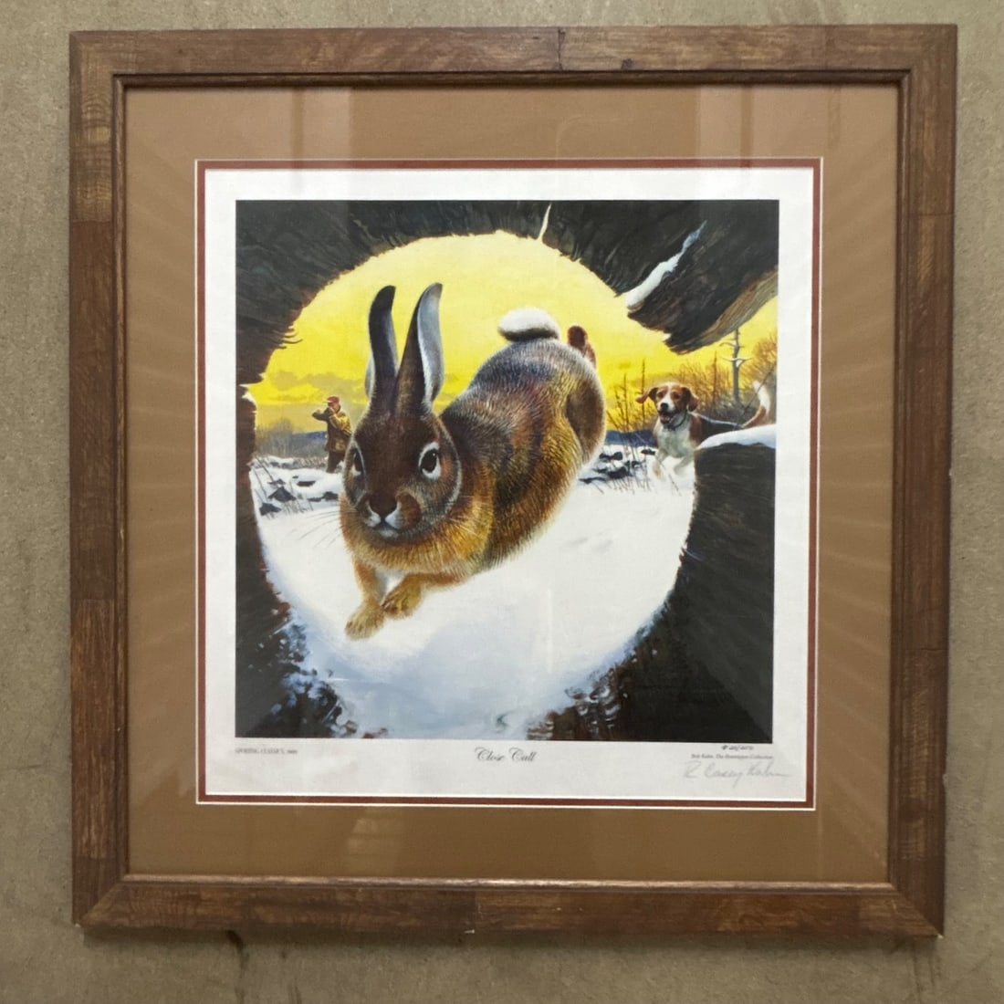 Bob Kuhn "Close Call" Signed Limited Edition Print 20/250 Sporting Dog & Rabbit: This is a signed and numbered limited edition print titled "Close Call" by renowned wildlife artist Bob Kuhn. The print depicts a dynamic scene of a rabbit escaping a hunting dog through the snow, wit