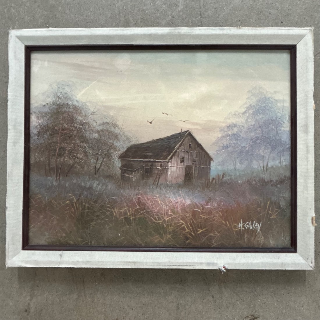 H. Gailey Barn Landscape Oil Painting Rustic Farmhouse Ambiance Misted Field: This charming oil painting depicts a rustic barn scene set against a softly misted landscape. The artist, H. Gailey, has captured a tranquil rural atmosphere with a focus on the weathered textures of