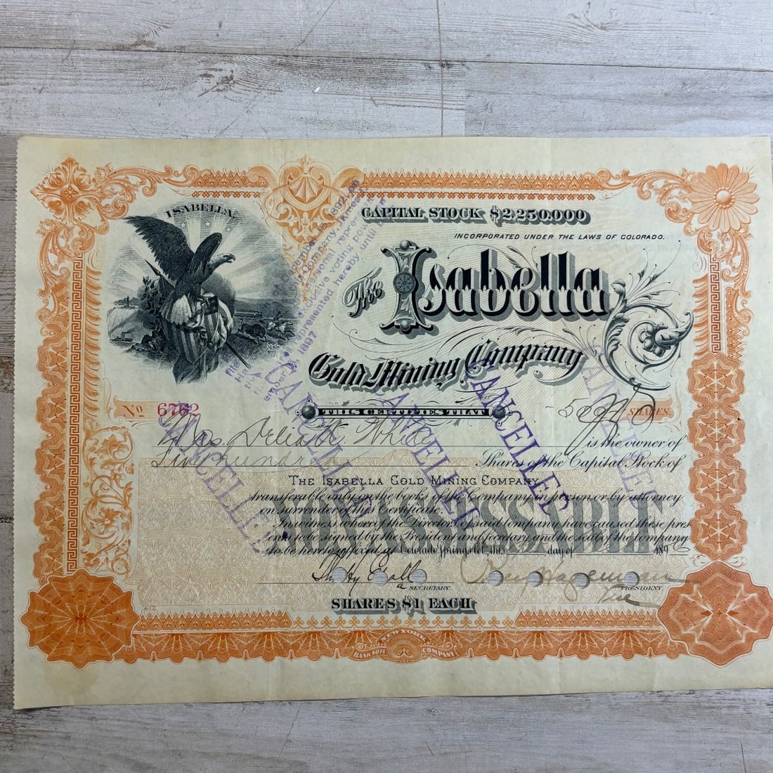 Antique Isabella Gold Mining Company Stock Certificate Colorado 1897: This is a vintage stock certificate from The Isabella Gold Mining Company, incorporated under the laws of Colorado. The certificate is dated December 2nd, 1897, and is for 500 shares at $1 each, repre