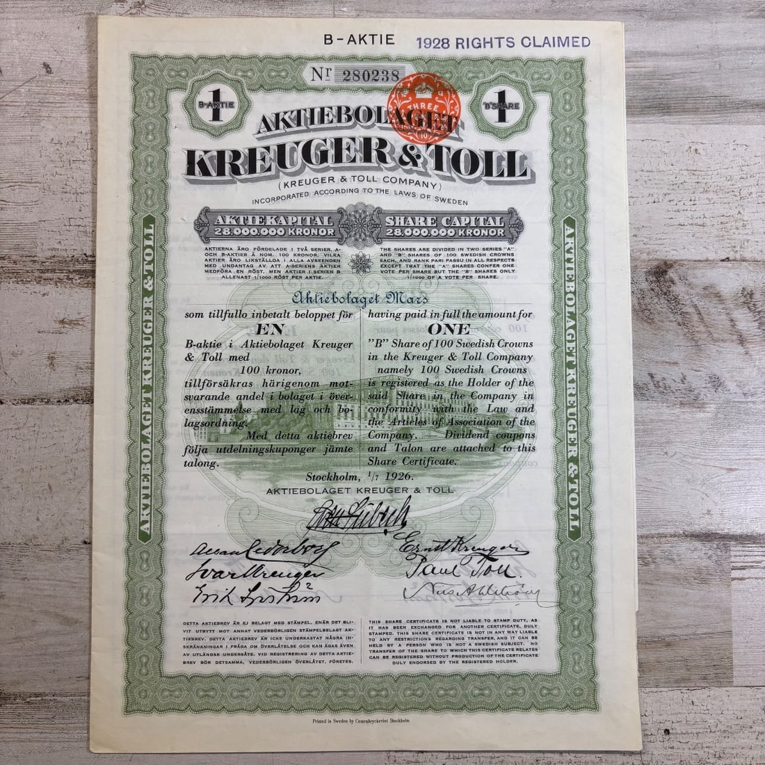 1926 Aktiebolaget Kreuger & Toll Share Certificate Stockholm Sweden: This is a stock certificate from Aktiebolaget Kreuger & Toll, dated 1926, from Stockholm, Sweden. The certificate represents share capital of 28,000,000 Kronor and is for 100 Swedish Crowns. It includ