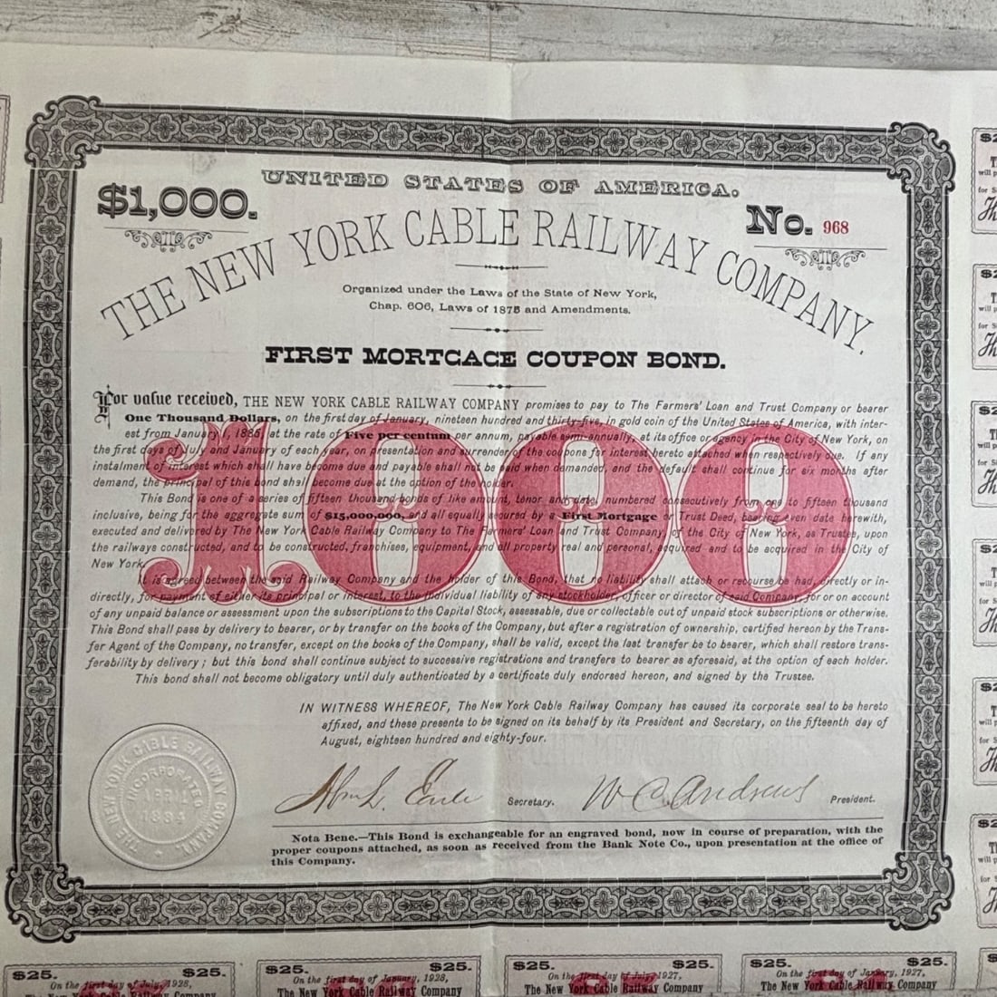 New York Cable Railway Company $1,000 First Mortgage Coupon Bond No. 968: This is a historic $1,000 First Mortgage Coupon Bond issued by the New York Cable Railway Company, dated August 15, 1884. The bond is accompanied by a full sheet of $25 interest coupons, many of which