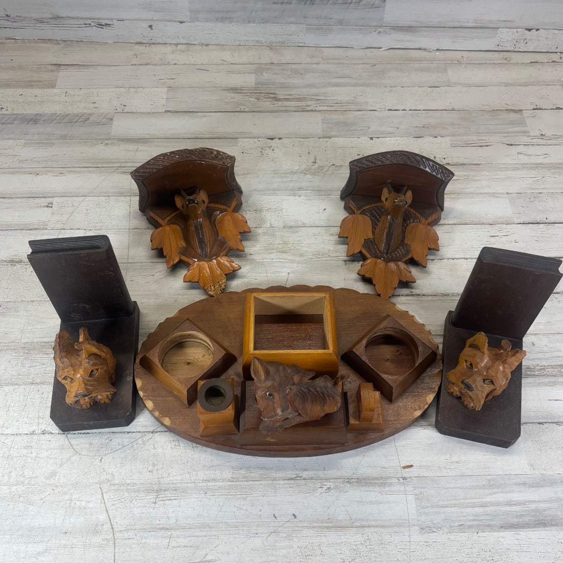Vintage Carved Wood Wall Mount Shelf Set w/ Dog & Deer Motifs & Trinket Tray: This charming vintage set features hand-carved wooden pieces with a Black Forest aesthetic. The collection includes two wall-mounted shelves, each adorned with a carved deer head and decorative leaves