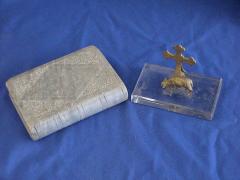 Set of 2: 1) clear glass base with metal lamb: Set of 2: 1) clear glass base with metal lamb and cross, and 2) marble "book" inscribed "J. McHugh, born 1850, aged 27" and a cross on one side