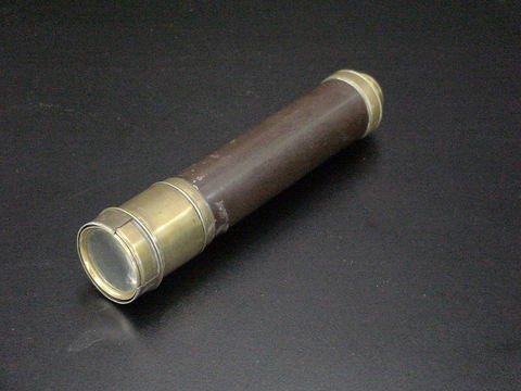 Brass spy glass with lens cover, marked Dolland