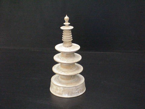 Wooden Buddhist shrine prayer tower. Top pulls of: Wooden Buddhist shrine prayer tower. Top pulls off, you record your prayer on paper and place inside shrine, 4" diameter, 9" high.