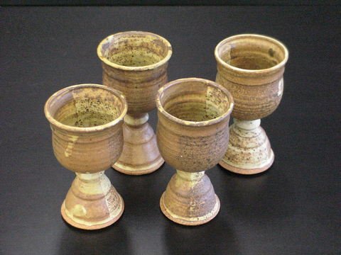 4 Brown Speckled Glazed Stoneware Goblets Signed: Set of 4 brown speckled glazed pottery goblets, two are signed but illegible, all 3" diameter, 6" high. Could be egg cups.