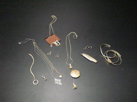Misc Jewelry Pieces - Costume, Locket, and more.: Lot of misc jewelry pieces, mainly costume - includes tiny locket on chain, "Becky" necklace, monkey, screw-back earring pieces, rose pendant on chain, pocket knife, pocket watch cover, 12k G.F. cuff