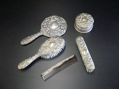 5 pc. Sterling silver dresser set mark B & Co. wi: 5 pc. Sterling silver dresser set mark B & Co. with touch marks, anchor, lion & K, Sterling silver, tortoise shell comb & brush.