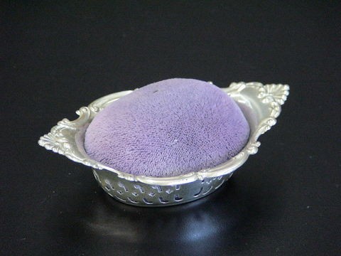 Sterling silver pin cushion marked Gorham, lavend: Sterling silver pin cushion marked Gorham, lavender covered cushion, 4780 with touch marks, measurements 4"L x 2.5"W, weight .72 troy ounce.