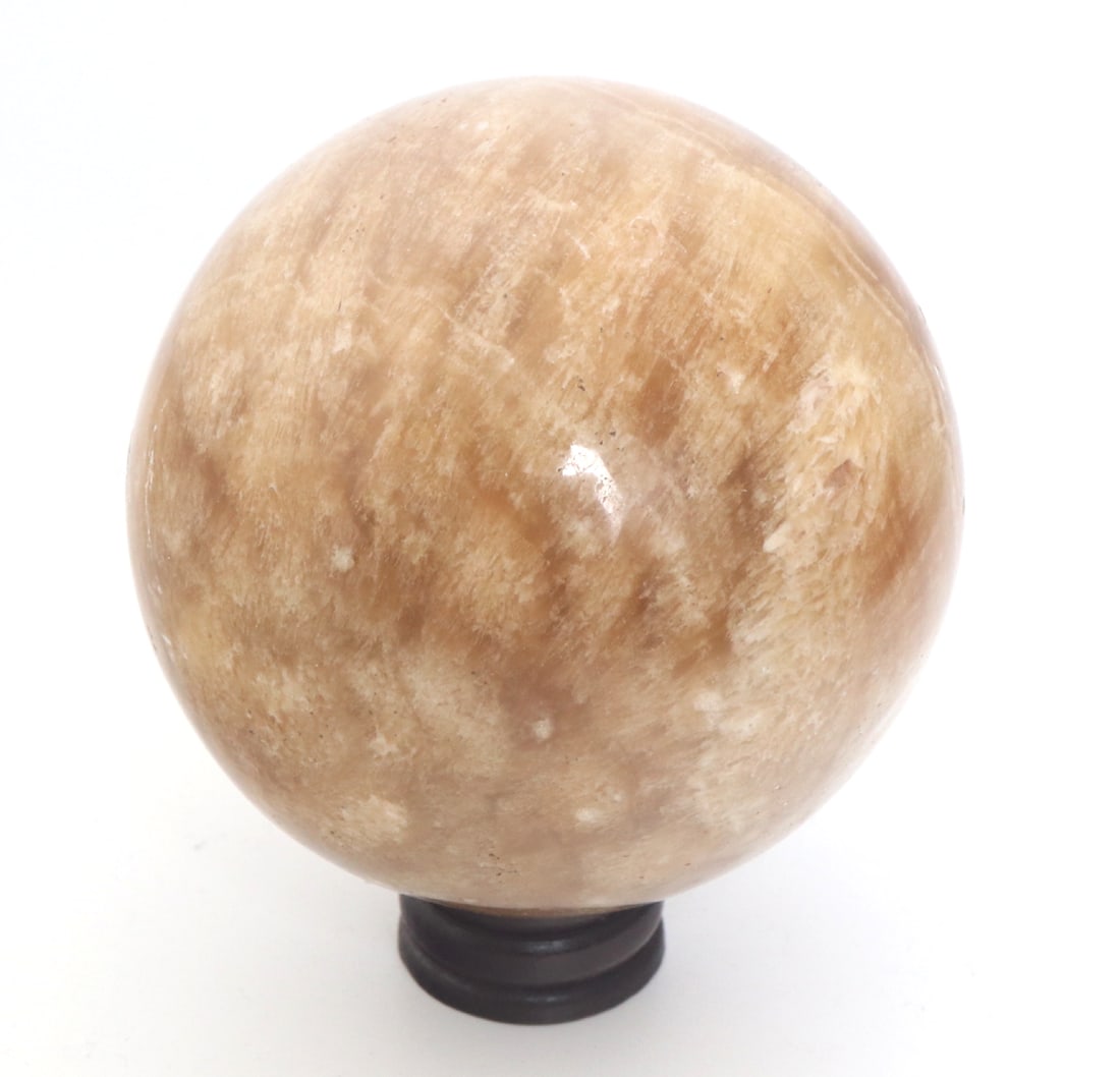 Lovely All Natural Peach Moonstone Sphere on Stand: All natural polished peach moonstone sphere with a beautiful galaxy of colors ranging from rich caramel brown, rich creamy white, and natural crystal inclusions throughout. All natural polished peach