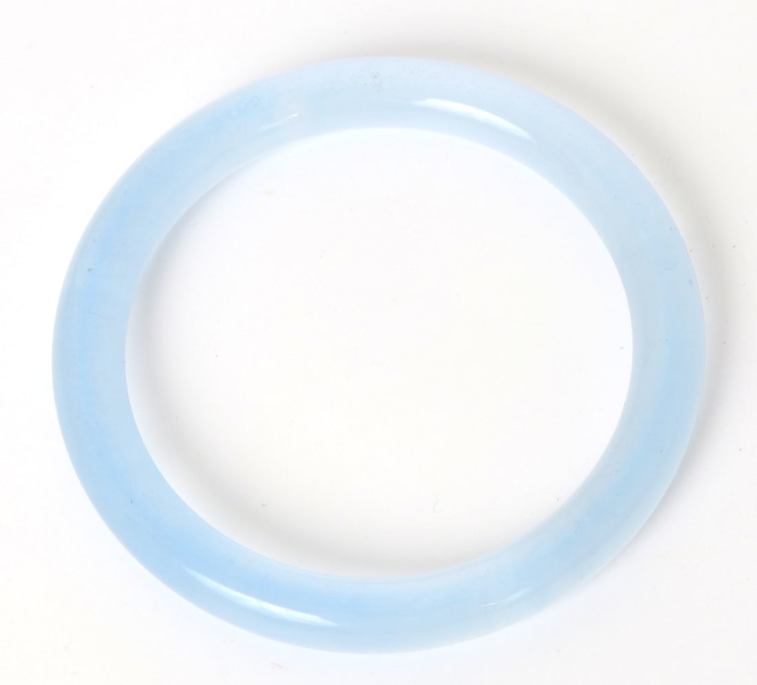 Light Blue Aquamarine Bangle: Beautiful light blue bangle bracelet comprised of aquamarine with natural inclusions throughout. Lovely cloud like designs in the natural polished mineral bangle. Beautiful light blue bangle bracelet