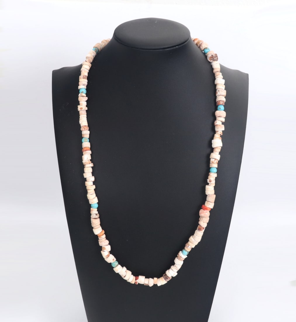 Vintage Coral & Turquoise Necklace: Beautiful string of coral and turquoise beads ranging from bright pink coral to pure white, earthen tones in between. Lovely bright turquoise polished beads in between. Size 24" L