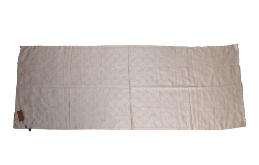Cashmere & Wool Gucci Champaigne Scarf: Gorgeous rose or champagne colored original Gucci scarf or shall. Lovely gold thread accents throughout make the piece shimmer like bubbles in champagne with a slightly frayed edge. Light baby pink