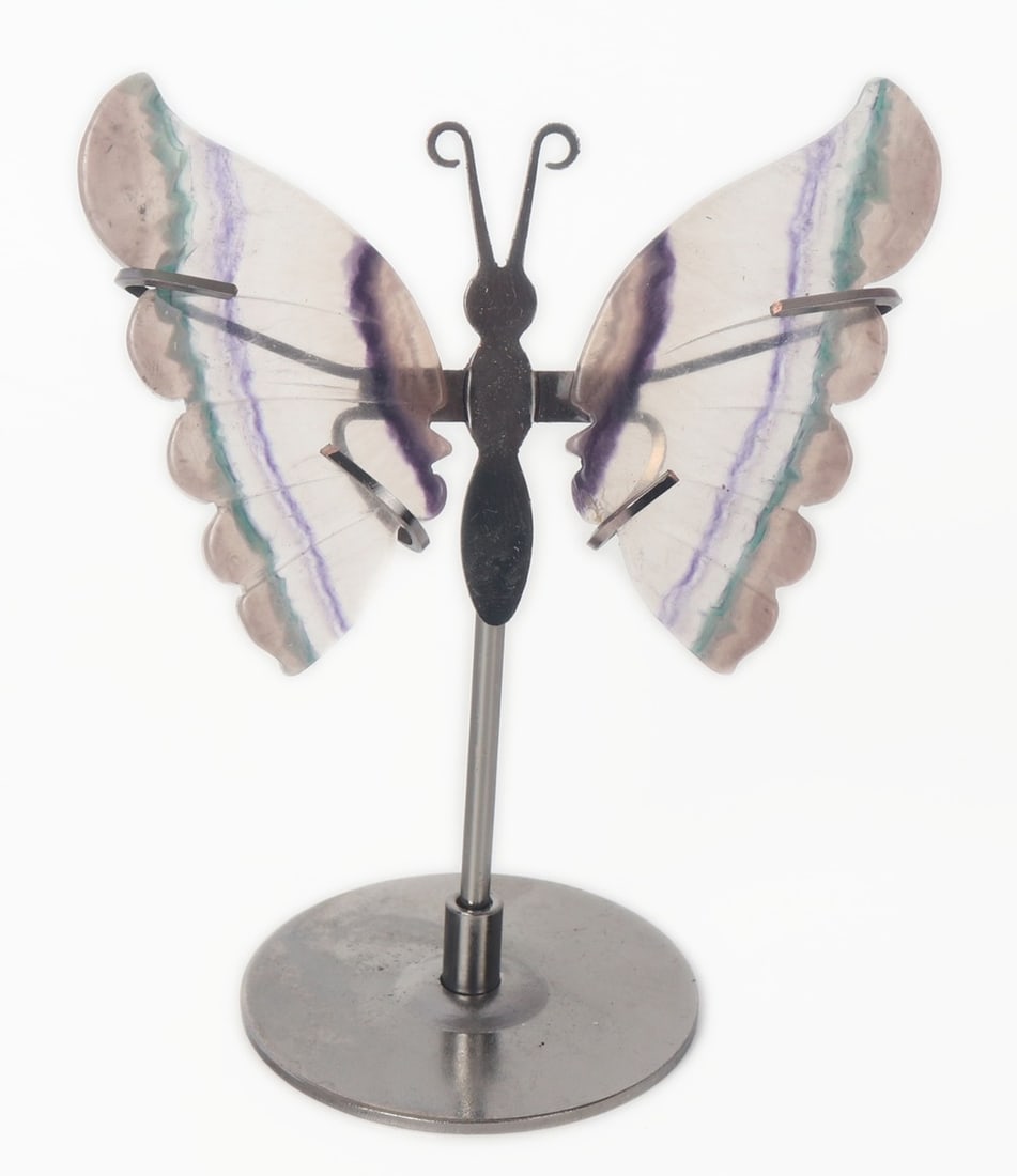 Lovely Rainbow Flourite Butterfly on Stand: Beautiful all natural rainbow flourite mineral sections carved into butterfly wings with incised details to the wings face. Mounted on a silver allow metal mount and stand. Flourite is almost complete
