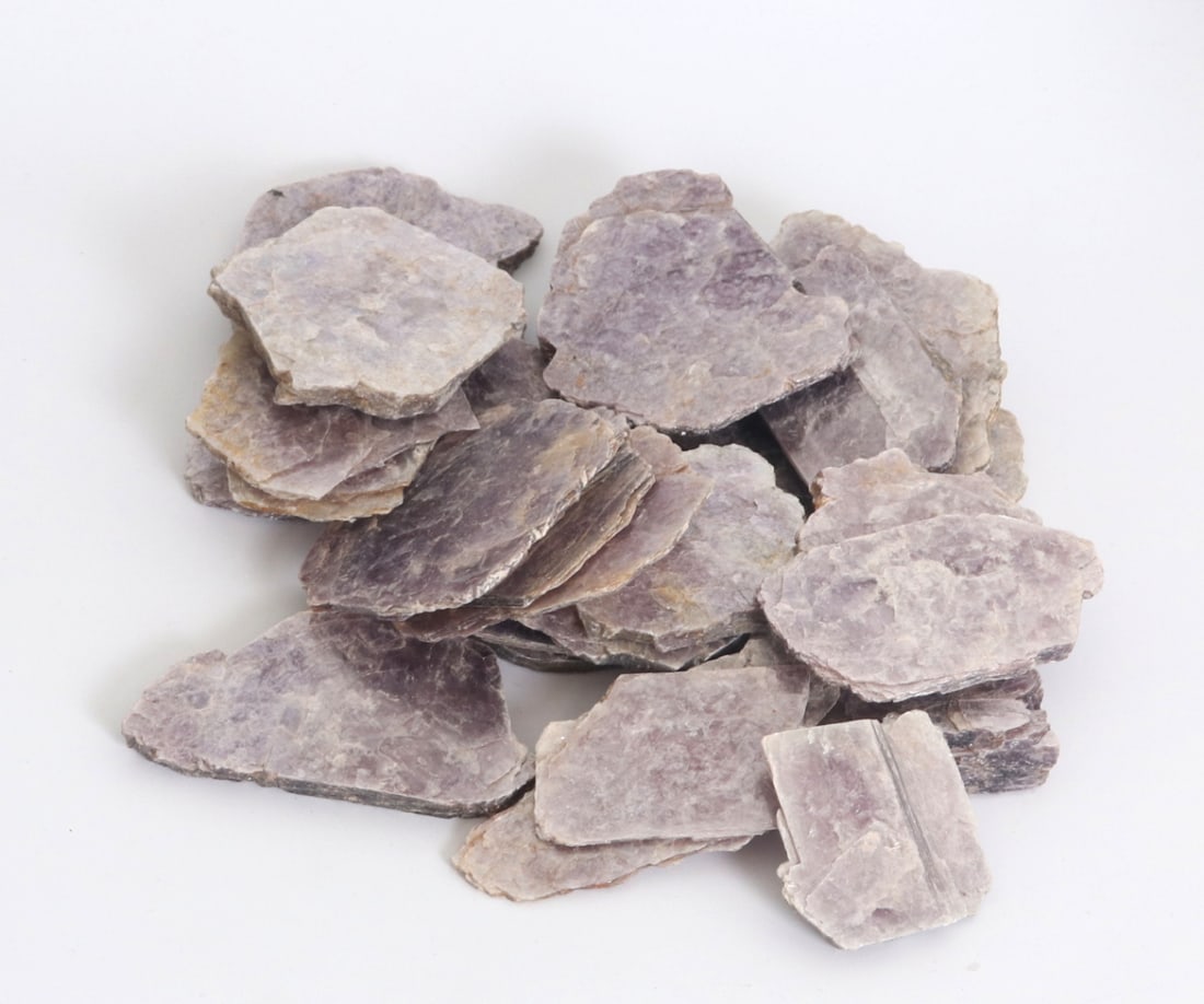 Group of Twenty Five Pieces of Mica: Nice group lot of twenty five various sized slabs of mica with lovely iridescence throughout each piece. Wonderful group for collections or crafts. Size of largest piece 4" W