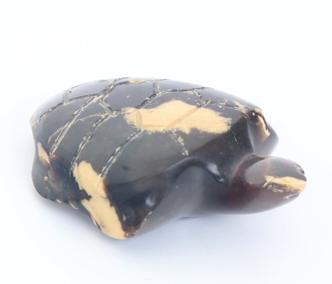 Adorable Amber Carved Miniature Turtle: Cute miniature all natural ancient amber carved and shaped into an adorable turtle figurine. Beautiful warm caramel coloring throughout with bright cream crystallization and inclusions throughout.
