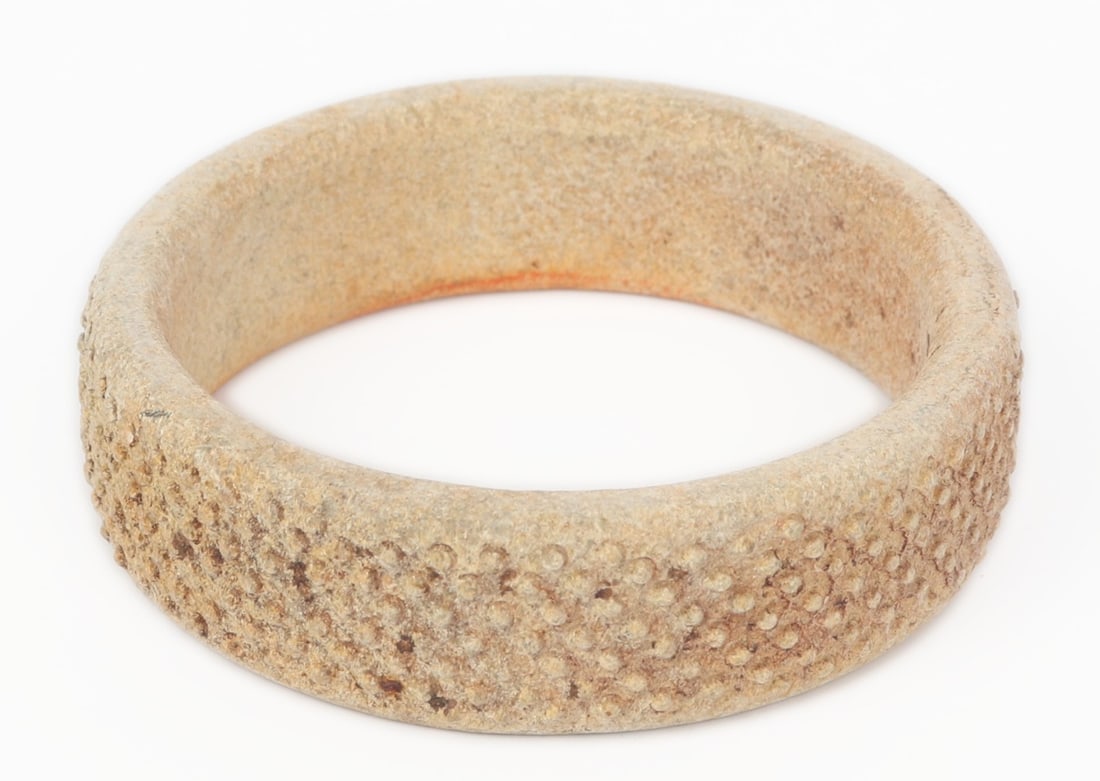 Unique Cream Stone Bangle Bracelet: Lovely cream colored stone bangle bracelet with a raised dotted exterior throughout. Smooth to the interior for ease of wear. Size 2 1/2" W (6.3cm W)
