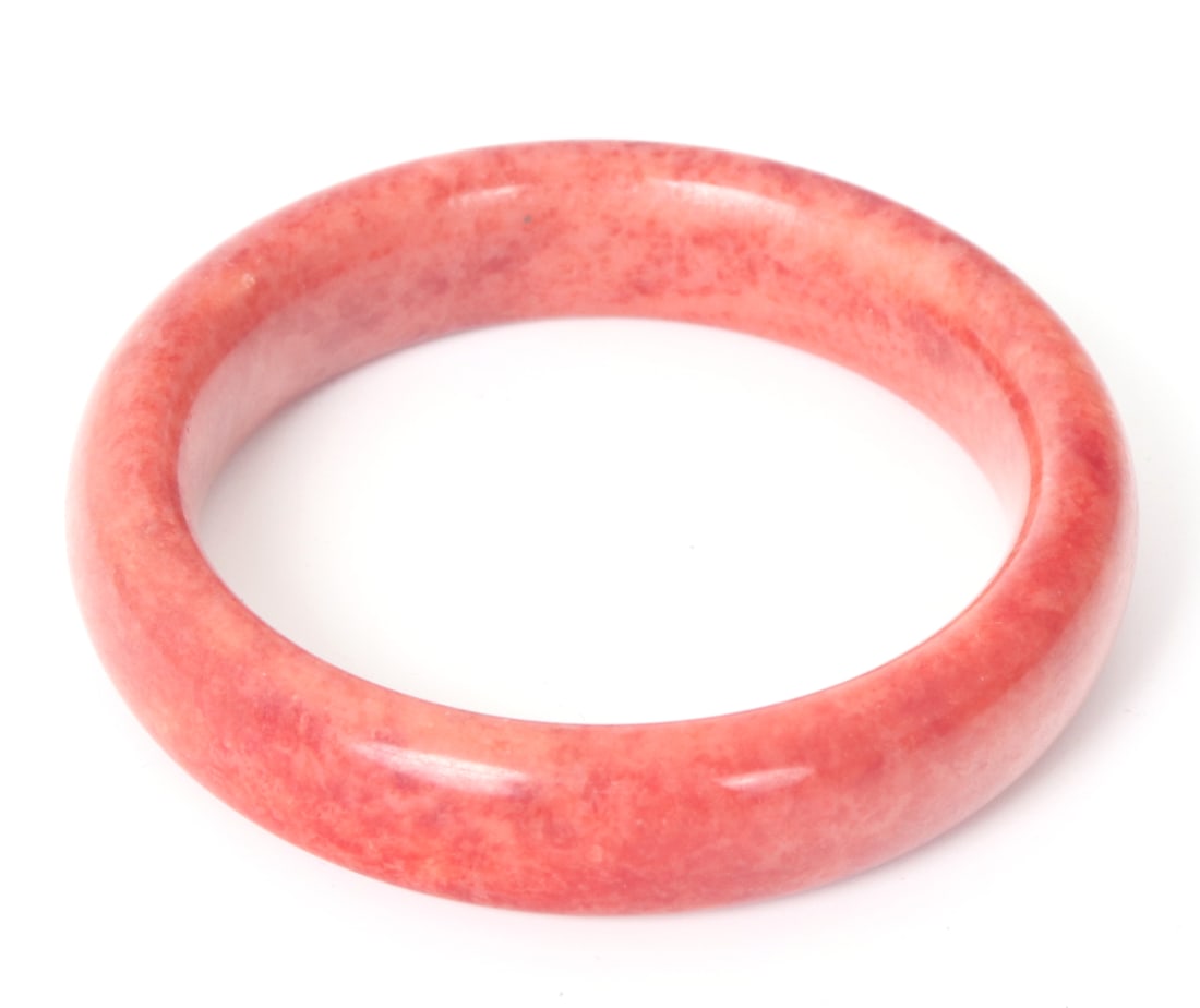 Chinese Chicken Blood Jade Style Bangle: Stunning and unique Chinese chicken blood jade style bangle with incredible red, pink and orange coloring throughout. Unique marbling throughout makes for a wonderful fashion statement. Size 2 1/4" W