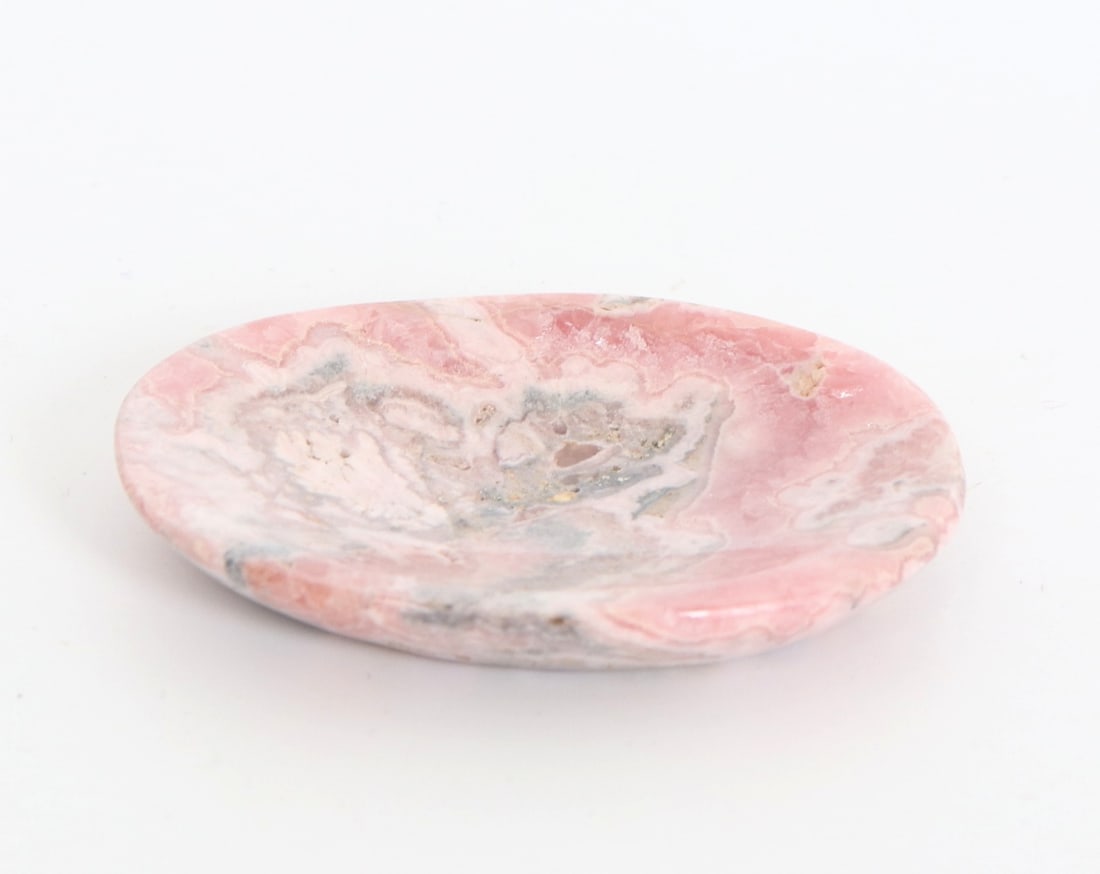 Lovely All Natural Rhodochrosite Miniature Dish: Beautiful all natural rhodochrosite mineral specimen polished into a small trinket dish or meditation stone. Natural crystallizations and pitting throughout. Light pink, aquamarine blue, yellow and