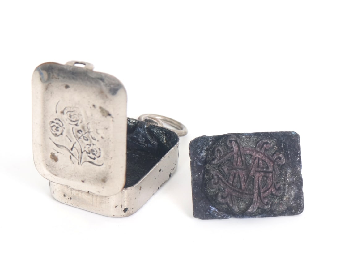 Lovely Victorian Seal Stamp & Locket: Beautiful custom made seal stamp for someone with the initials C.M. with red pigment or ink left over on the stamp itself. Adorable carrying locket with a loop at the top for suspension. Incised