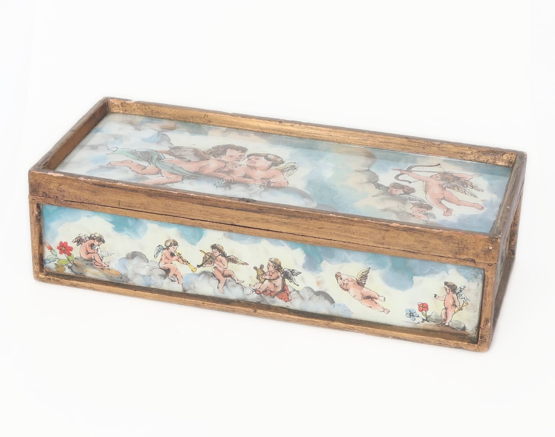 1920's Wood Jewelry Cupid Painted Box: Vintage wood jewelry box with cupids painted possibly on metal panels with a glass top on four sides. The top of the box a pair of cupids speak to each other almost in secret, while the other cupids l