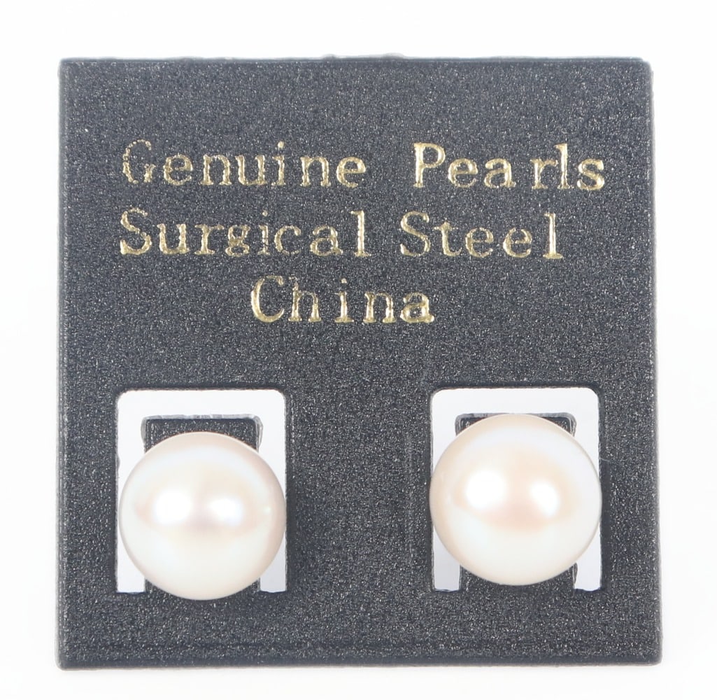 Timeless Pearl Earrings with Surgical Steel Post: Beautiful pair of natural pearls mounted on surgical steel posts for ease of wear. Slightly iridescent in natural light with a wonderful natural shine.