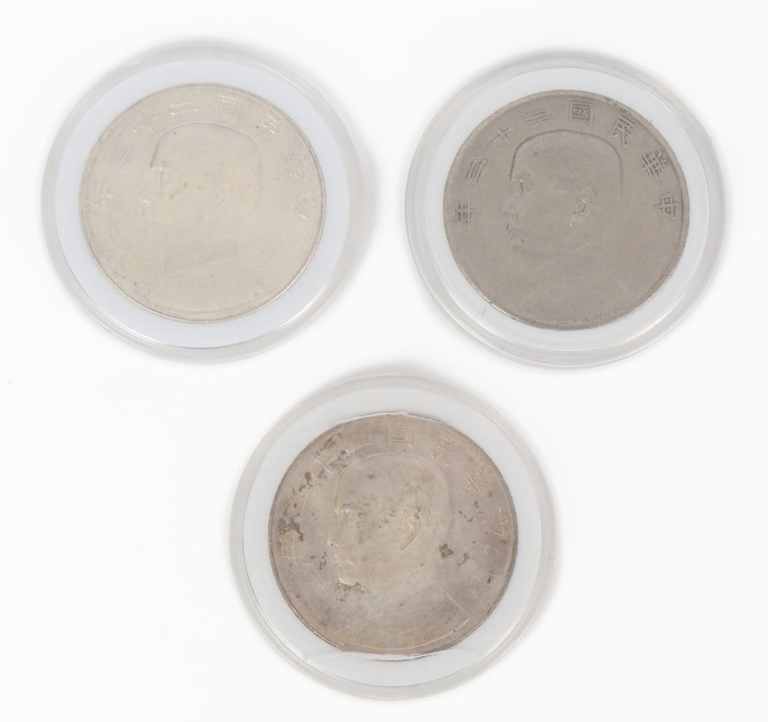 Group Lot of Three Chinese Style Coins: Group lot of three Chinese silver dollar style coins. Size of each case 2" W (5.1cm W)