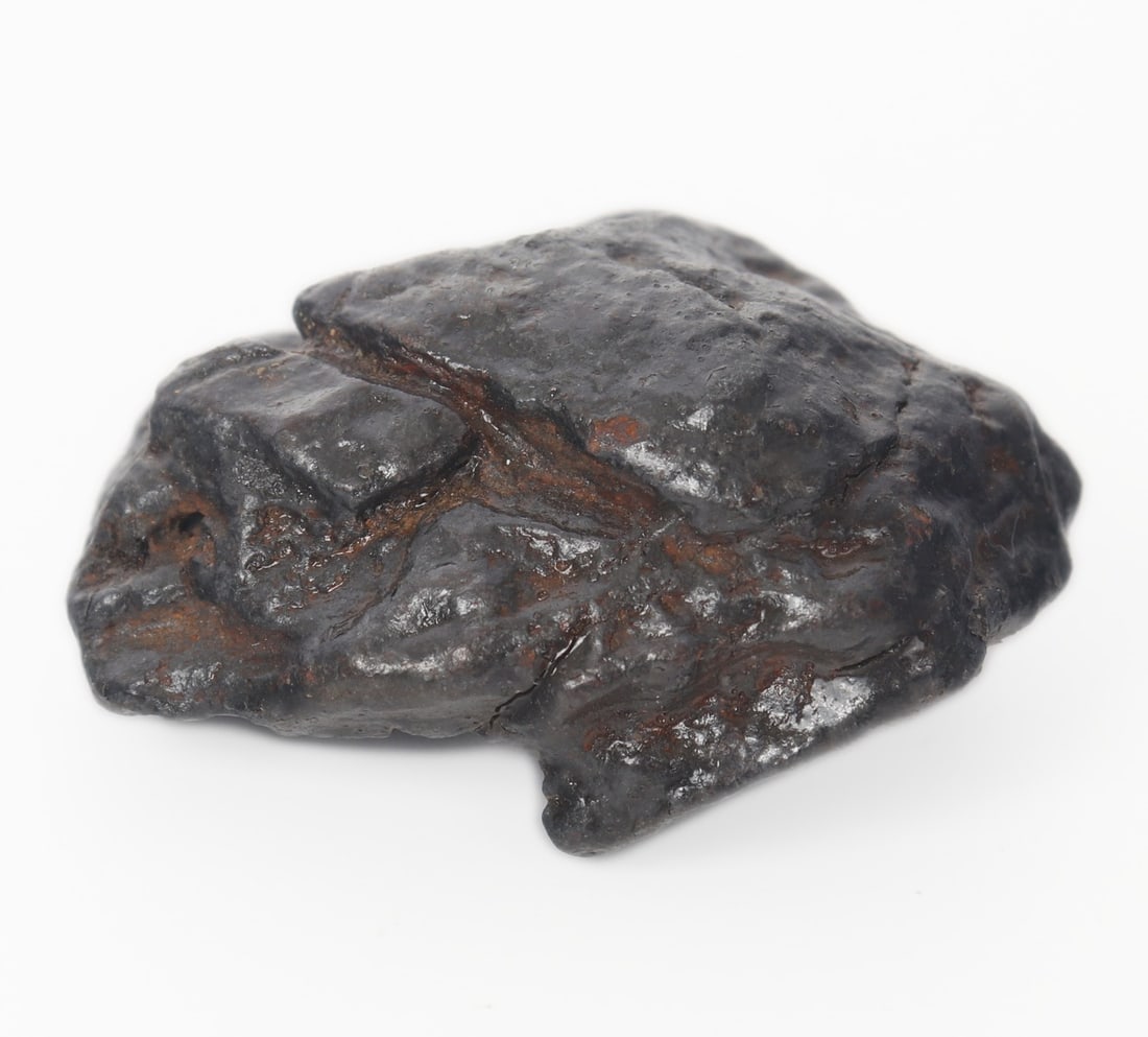 Fine Ancient Iron Nickel Meteorite, Nantan, 69 grams: Wonderful ancient meteorite from the Nantan region of China. Known for their unique sculptural surface textures created during atmospheric entry, and naturally occurring regmaglypts. This particular s