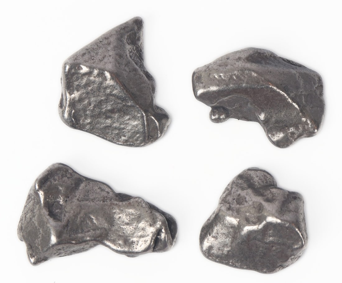 Wonderful Collection of Four Ancient Aletai Meteorites, 245g: Fine group lot of four ancient meteorites from China, each with a beautiful natural chrome like shine. Smooth surface cold to the touch with iron and earthen deposits throughout. Measurements