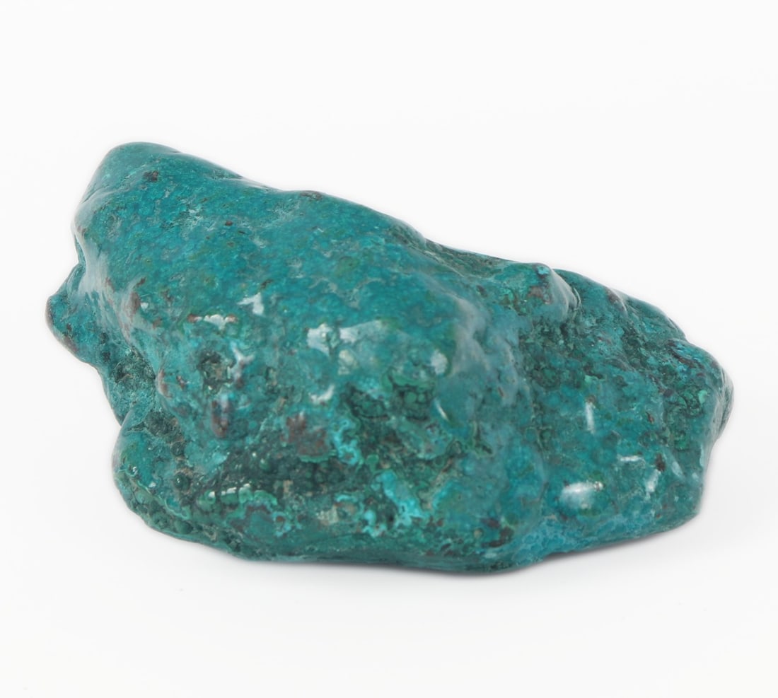 Beautiful Freeform Chrysocolla Mineral Specimen: Incredible striking turquoise color chrysocolla mineral specimen with beautiful dark green malachite sections peaking out. Unique aquamarine or deep turquoise color throughout. Weighs 250 grams. Size
