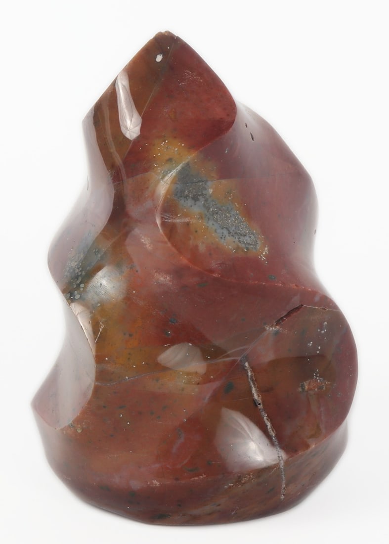 Wonderful Ocean Jasper Flame Carving: Beautiful all natural ocean jasper mineral specimen in the shape of a small but mighty flame. Colors throughout are mesmorizing and include red, yellow, crystal grey, and dark green specks