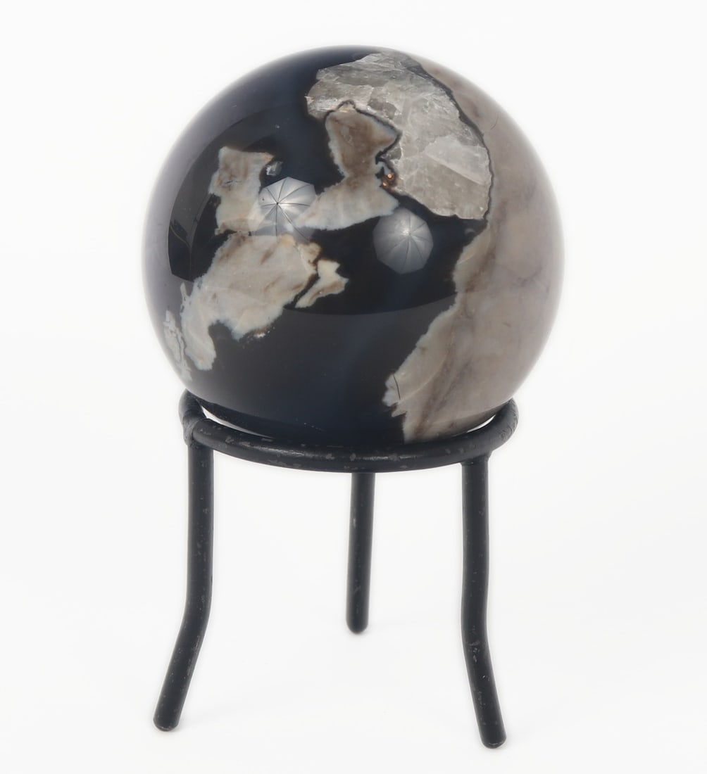 Stunning Volcanic Agate Crystal Sphere, UV Reactive, with Stand: Incredible unique polished sphere of all natural volcanic crystal agate in the shape of a perfectly polished sphere. The piece reacts in a phenominal illuminescent way when held against UV light,