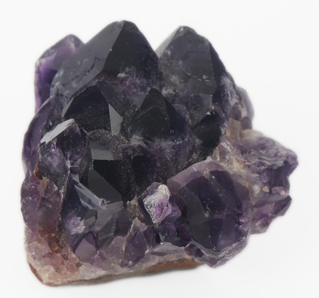 Beautiful Raw Section of Amethyst, 320 grams: Lovely section of raw amethyst mineral specimen with fine dark purple terminals and points. Some areas of pure clairty with white crystal accents, wonderful sparkle in the sunlight. Layered rock