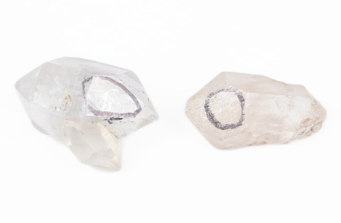 Pair of Raw Rock Crystals w/Ancient Water, 35g: Wonderful pair of rock crystal clusters with ancient water trapped inside. Noted by the black marker on the pieces, best scene when held to natural light and the movement of the water is present. Love