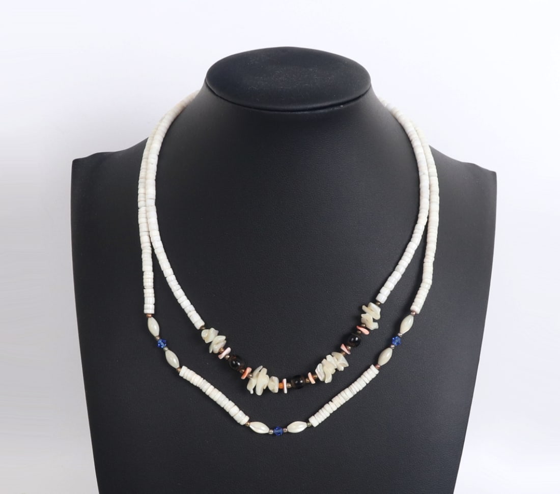 Lot of Two Shell & Mother of Pearl Necklaces: Beautiful dainty crafted necklaces with circular shell beads and mixed free form sections of mother of pearl beads accenting throughout. Could be worn together layered or for different occasions. Size