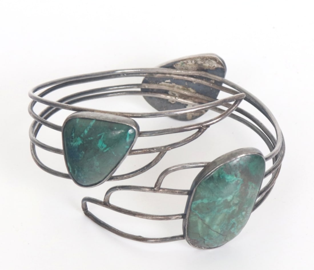Malachite Inlayed Cuff Style Bracelet: Handmade wire cuff bracelet with wing style cuff and three large sections of polished all natural malachite mineral specimens. Size of inner diameter 3" W