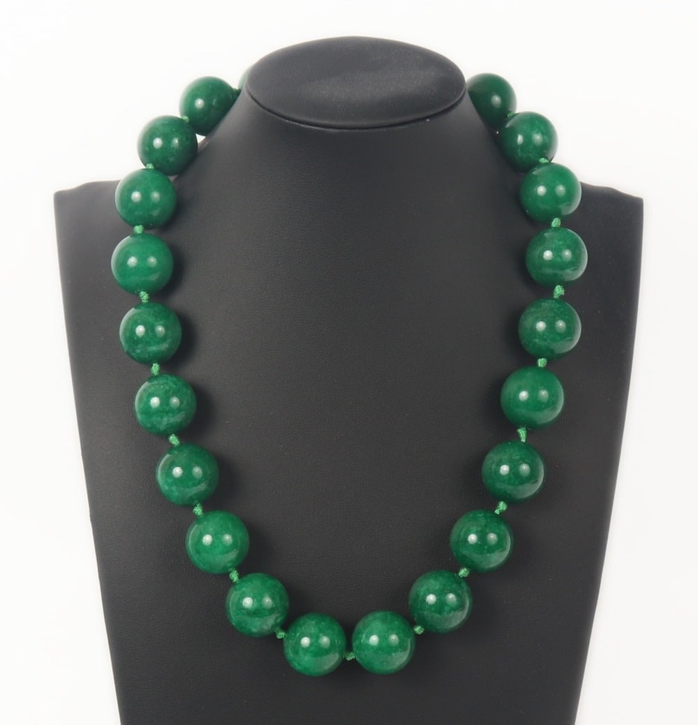 Gorgeous Heavy Chinese Jade Chunky Beaded Necklace: Wonderful heavy Chinese jade beaded necklace with 22 perfectly polished spherical beads. Accented and strung together on a gorgeous bright green thread that's knotted in between each bead. Size 20" L