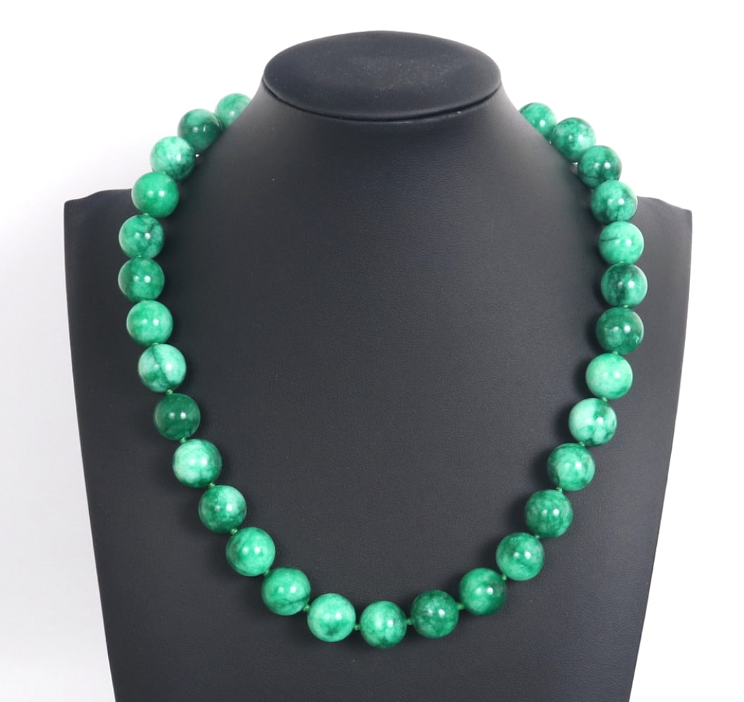 Chinese Marbled Jade Style Beaded Necklace: Stunning Chinese jade style necklace with thirty one perfectly polished bright green marbled against dark green beads. Each bead uniquely colored throughout, strung together with a dark green thread, 