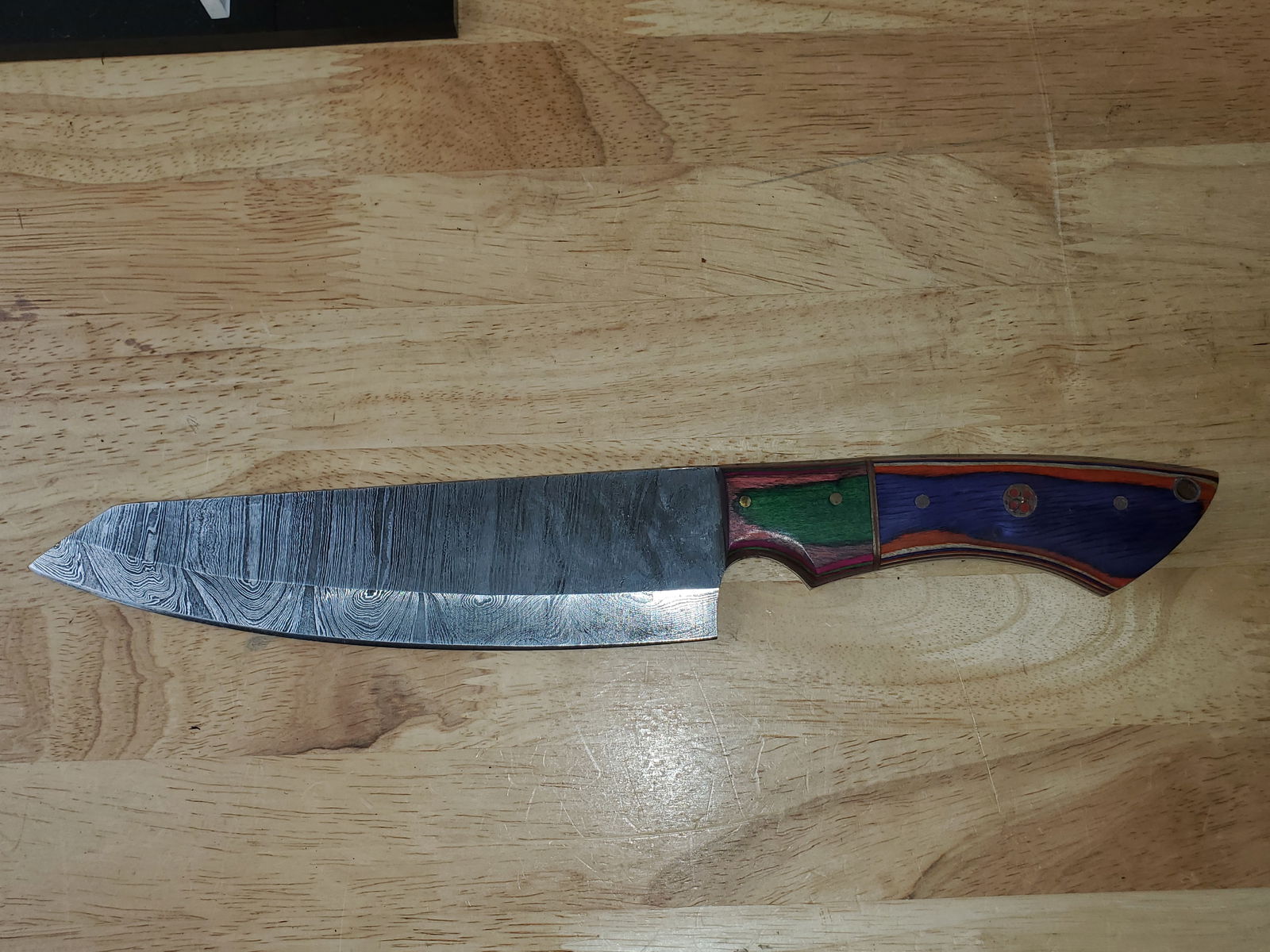 Beautiful Handmade Damascus Steel Chef Knife: Beautiful Handmade Damascus Steel Chef Knife. See photos for details and measurements. Meticulously crafted by skilled artisans, each knife is forged from multiple layers of high-carbon steel?heated,