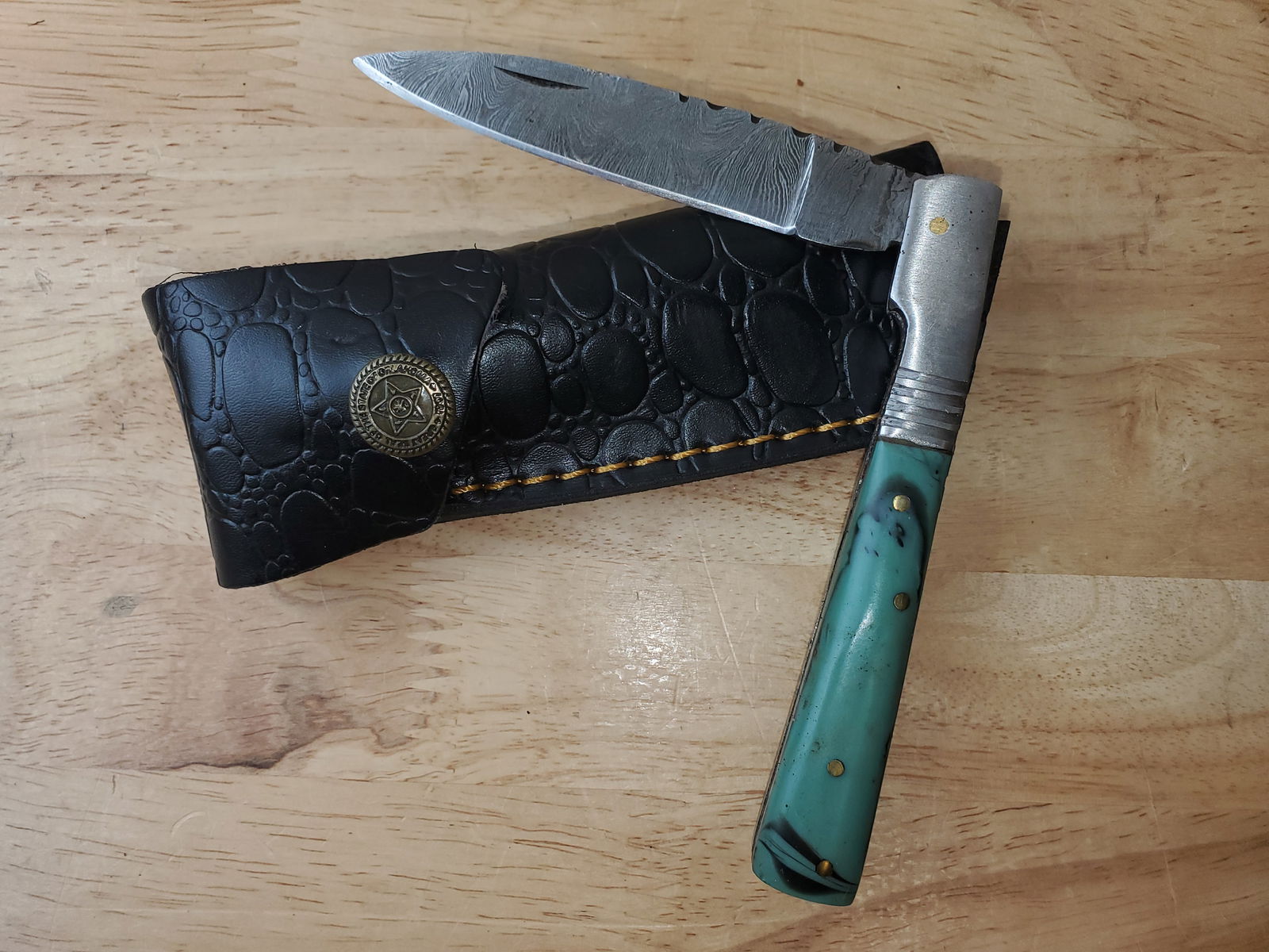 Beautiful Handmade Damascus Steel Folding Knife w/Sheath: Beautiful Handmade Damascus Steel Folding Knife w/Sheath. See photos for details and measurements. Meticulously crafted by skilled artisans, each knife is forged from multiple layers of high-carbon st
