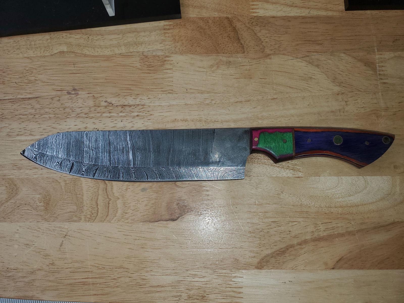 Beautiful Handmade Damascus Steel Chef Knife: Beautiful Handmade Damascus Steel Chef Knife. See photos for details and measurements. Meticulously crafted by skilled artisans, each knife is forged from multiple layers of high-carbon steel?heated,