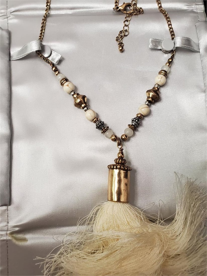 Rustic Natural Beads & Feather Tassel Necklace: Rustic Icing Natural Beads and Feather Tassel Necklace.
