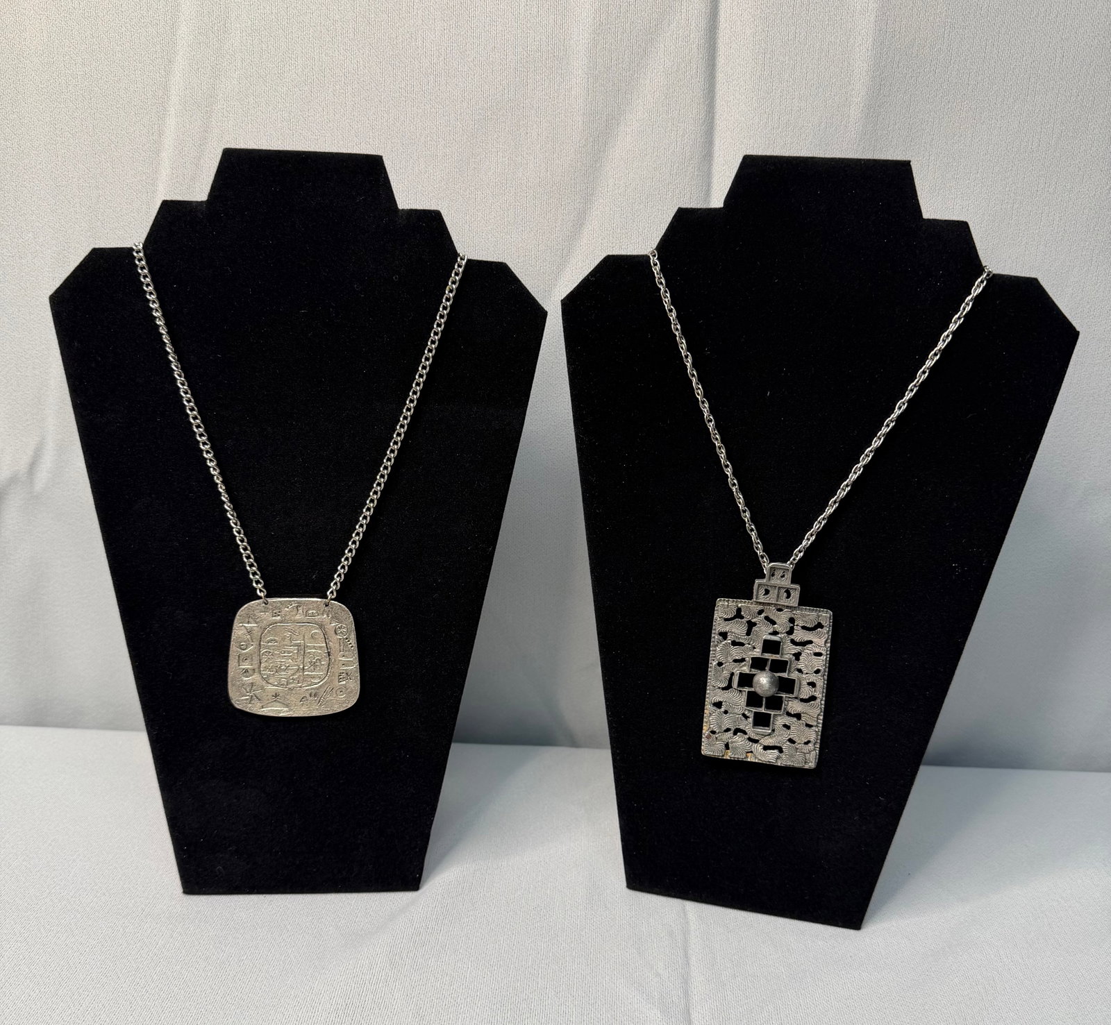 Pair of Decorative Silver Necklaces and Pendants: Pair of Decorative Silver Necklaces and Pendants