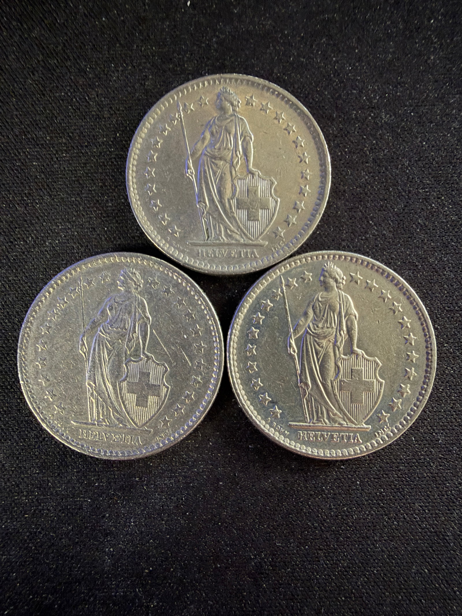 2 Franc piece from Switzerland: 2 Franc piece from Switzerland. Iconic "Standing Helvetia" design, which has remained largely unchanged since 1875. Helvetia is the female personification of Switzerland, depicted here holding a spear