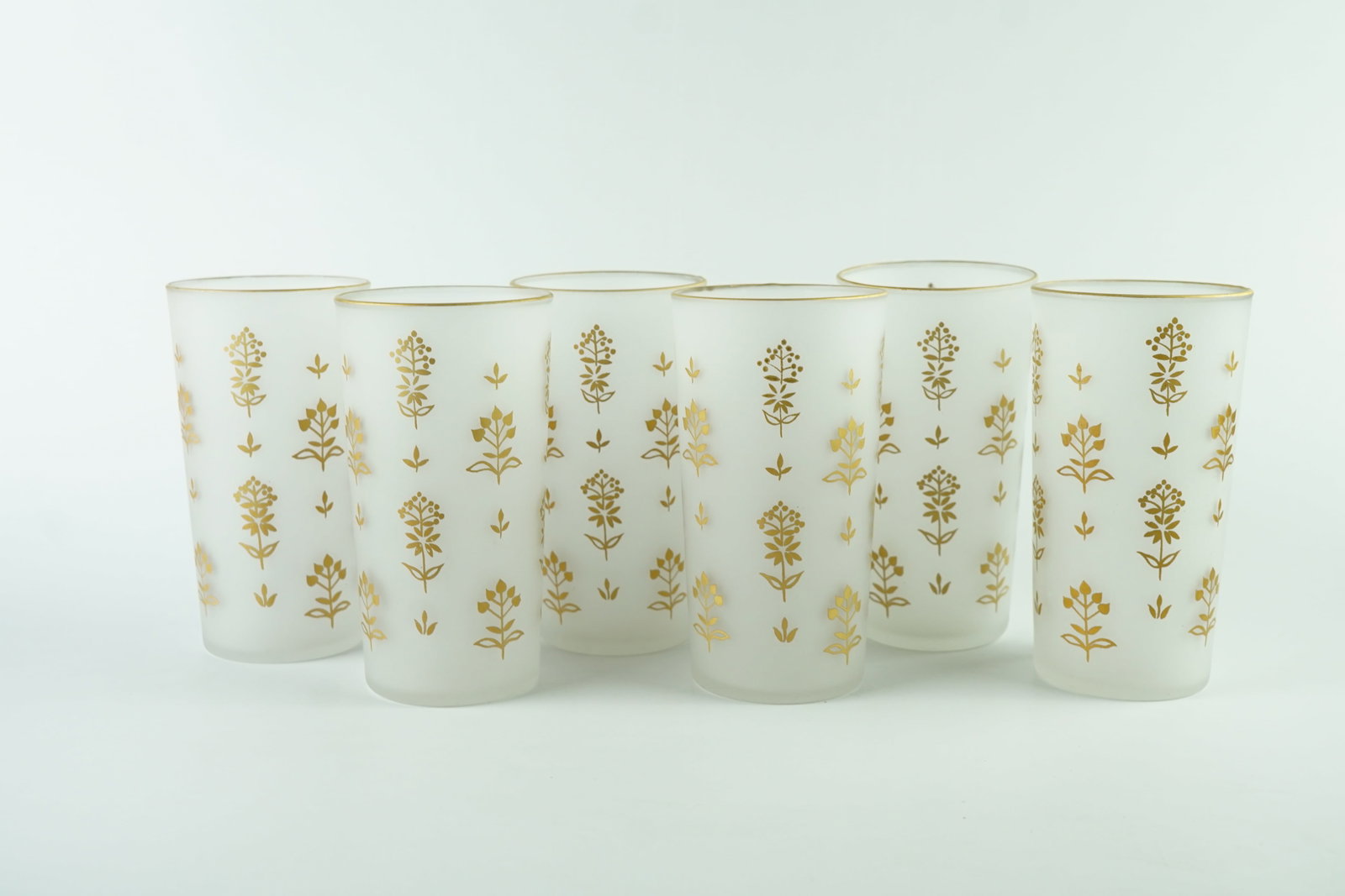 Vintage MCM Frosted Highball Glass Set: Beautifully made frosted glass with gold gilt paint. All are in excellent condition with no flaws or imperfections