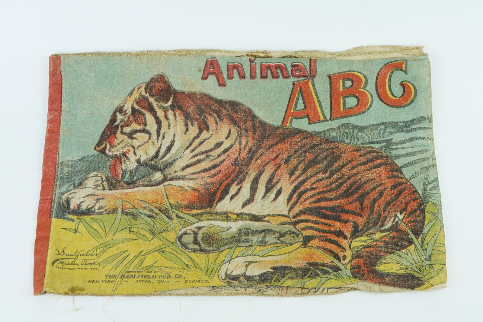 Antique Animal ABC Cloth Fabric Book: Published by Saalfield Publishing Co. in the early 1900's this is a very unique book. The type was printed in actual fabric instead of paper and considering its age is in nice condition. Minor stains