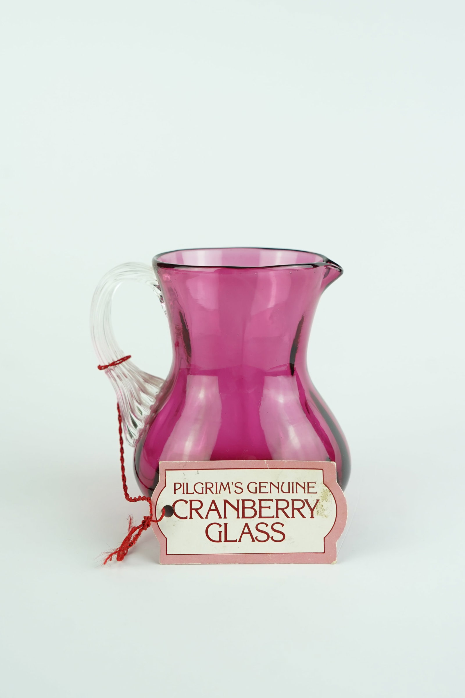 Vintage Cranberry Pilgrim Glass Pitcher: Pitcher is in pristine condition. Has the original tag on it from when it was new