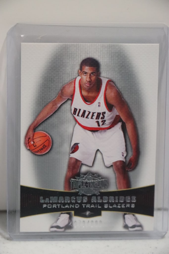 LAMARCUS ALDRIDGE 2006-07 TOPPS TRIPLE THREADS SILVER ROOKIE CARD (1 of 1)