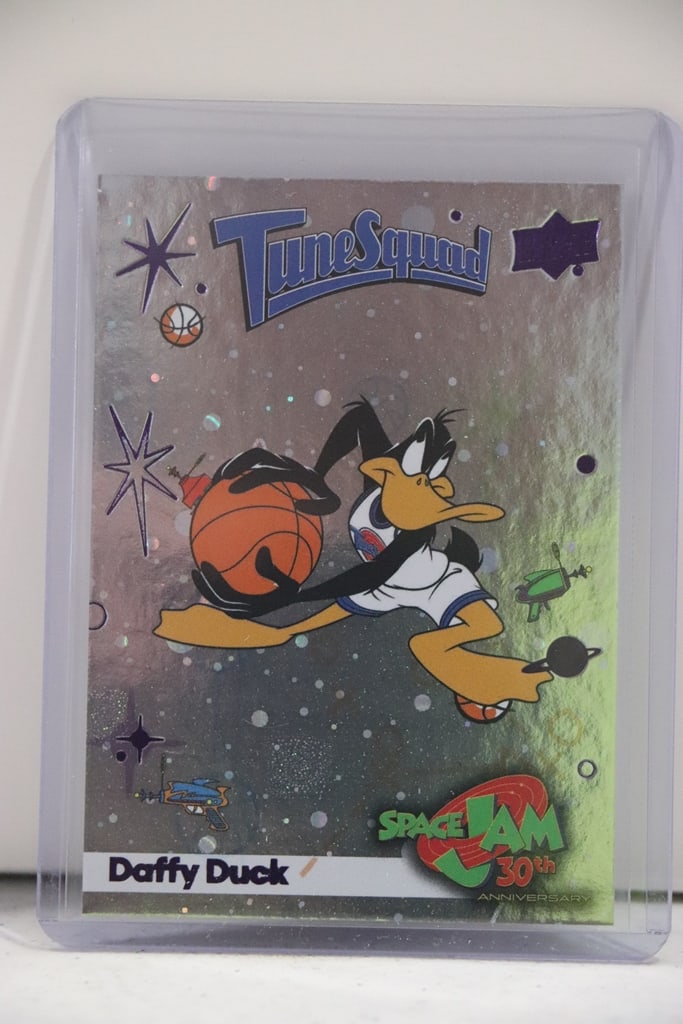 DAFFY DUCK 2025 UPPER DECK SPACE JAM 30TH COSMOS PURPLE: NEAR MINT OR BETTER CONDITION 